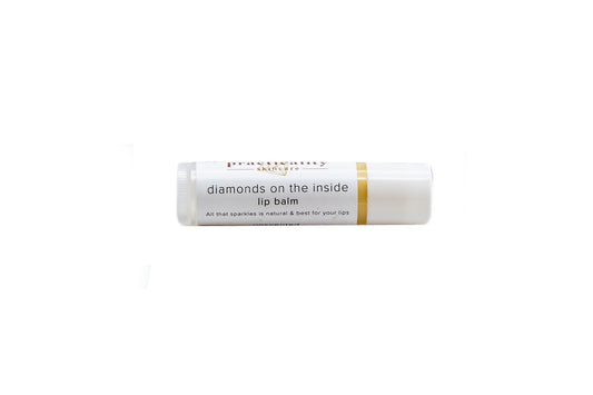 Practicality Diamonds on the Inside Unscented Lip Balm tube on a clean white background